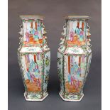 A pair of late C19th Cantonese famille rose porcelain vases, of hexagonal form, with alternating