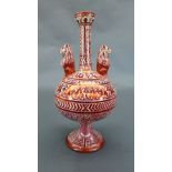 A late C19th Cantagalli pottery red lustre vase, the slender elongated neck flanked by lion