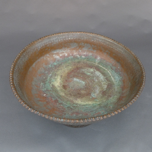 A very large Persian Safavid tinned copper bowl, C18th, the circular bowl with repeating floral - Image 2 of 3