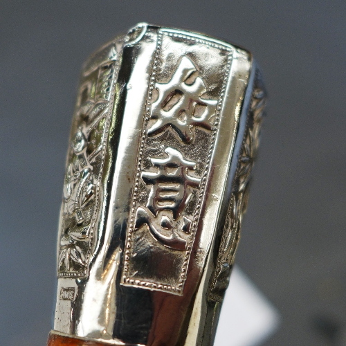 A Chinese export silver topped Malaca cane walking stick, the embossed handle of hexagonal form with - Image 4 of 6