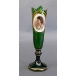 A Bohemian green glass bud vase, of tapering cylindrical form, with fitted opaque glass roundel