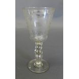 A C19th Continental glass hunting goblet, the bowl with etched and engraved decoration depicting