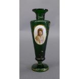 A Bohemian green glass vase, of urn form, having opaque glass roundel decorated with female