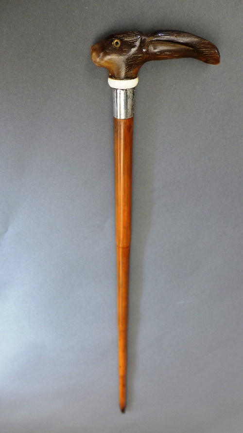 A horn handled walking cane, the handle fashioned in the form of a hare's head, fitted hallmarked