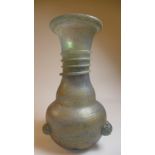 A Roman design iridescent glass vase, the elongated neck with applied bands above a squat body