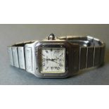 A Cartier stainless steel automatic gentlemans wristwatch, the dial with Roman numerals and