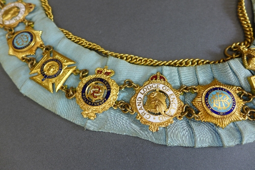 A Masonic chain of office, the sky blue ribbon with various gilt metal and enamel jewels. - Image 4 of 4