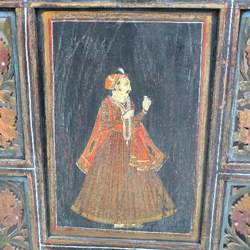A late C19th Qatar four-fold hardwood screen, the arched top panels painted with a seated couple - Image 3 of 4