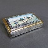 A Persian silver and enamel box, the stepped hinged lid with domed polychrome enamel panel depicting