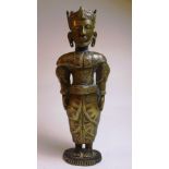 A bronze C19th figure of a King, probably Indian, the bearded and crowned figure attired in costume