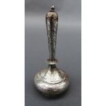 A Kashmiri silver vase and cover with allover flower and vine details (116.5 g). Height 17 cm