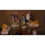 A group of three C19th Staffordshire figurines including Dick Turpin and Tom King with two similar