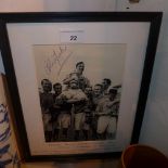 A framed photo of the Arsenal FA Cup winners in 1950