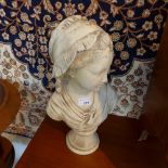 A pair of porcelain busts of a boy and a girl (A/F)