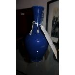 A Chinese dark blue glazed vase of baluster form