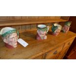 A group of four Beswick character jugs