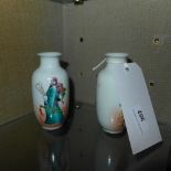 A pair of Chinese vases of small size decorated with warriors