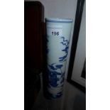 A Chinese blue and white vase decorated with battle scenes and of cylindrical form