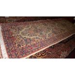 A Fine North West Persian Sarouk runner 286 cm x 78 cm repeating floral motifs on an ivory field