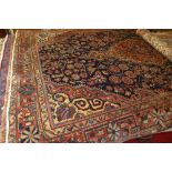 A fine North West Persian Sarovic Mahar rug 23 cm x 100 cm central pendant medallion on a navy field