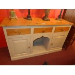 An old pine and painted sideboard fitted three drawers and pair of panel doors