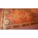 An extremely fine South West Persian Qashgai carpet, 290cm x 175cm, triple polo medallion on a