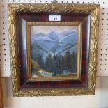 A central European mountainous landscape scene signed Stefan Filipkiewicz in a parcel gilt frame