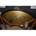 A Chinese hard stone and coral picture of vase of flowers within fan shaped ebonised frame