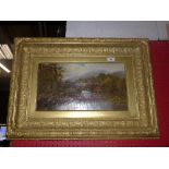 An oil on canvas of a river and bridge scene within gilt framed, signed L. Edgar