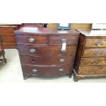 A mahogany bowfronted chest with two short over three long graduated drawers raised on bracket feet