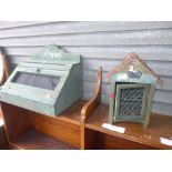 A white painted pine coat rack with clock surmount, a blue painted bread box and a similar egg box