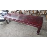 A red lacquered Chinese low table