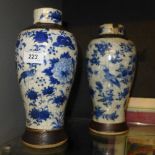 A pair of Chinese crackle glazed vases having bird and flower blue and white decoration (a/f)