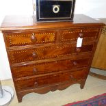 A Victorian mahogany chest with inlaid detail to two short over three long drawers with knob