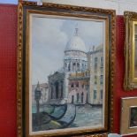 An oil on of Venice in gilt frame
