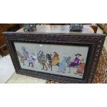 A late Victorian cloth and needlework picture of medieval procession in carved oak frame, glazed