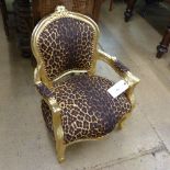 A child's fauteuil in leopard print