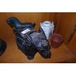 A Chinese teapot (a/f) three small terracotta teabowls, a pottery elephant and a metal horse