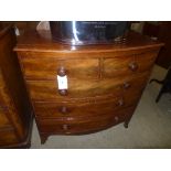 A C19th flame mahogany bowfronted chest, having two short above three long drawers, raised upon
