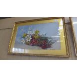 A watercolour of flowers signed A. Locke in gilt frame