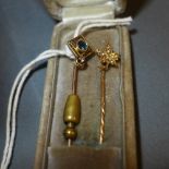 A 14ct gold stick pin set with sapphire and diamond and one other 14ct gold stick pin