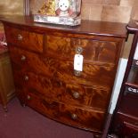 A C19th mahogany bow fronted chest fitte