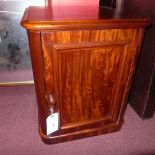 A Victorian mahogany side cupboard fitte