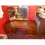 A 1960's designer dressing table with tr