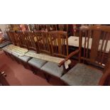 A set of seven Edwardian mahogany dining