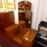 An Art Deco oak dressing chest with fram