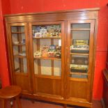An antique French oak bookcase fitted th