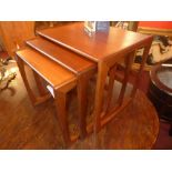 A G-Plan teak nest of three low tables o