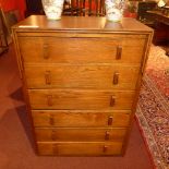 An oak tall chest fitted six drawers