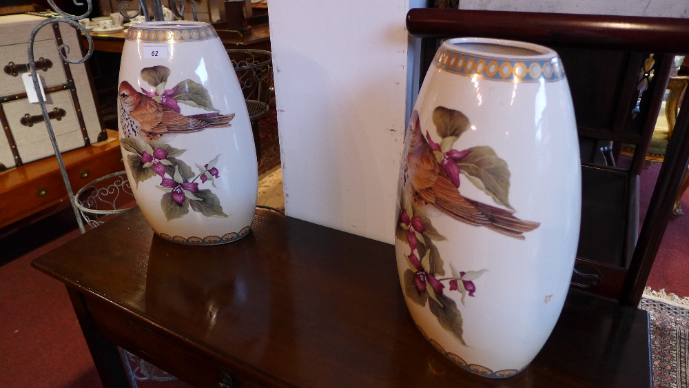 A pair of large porcelain vases decorate